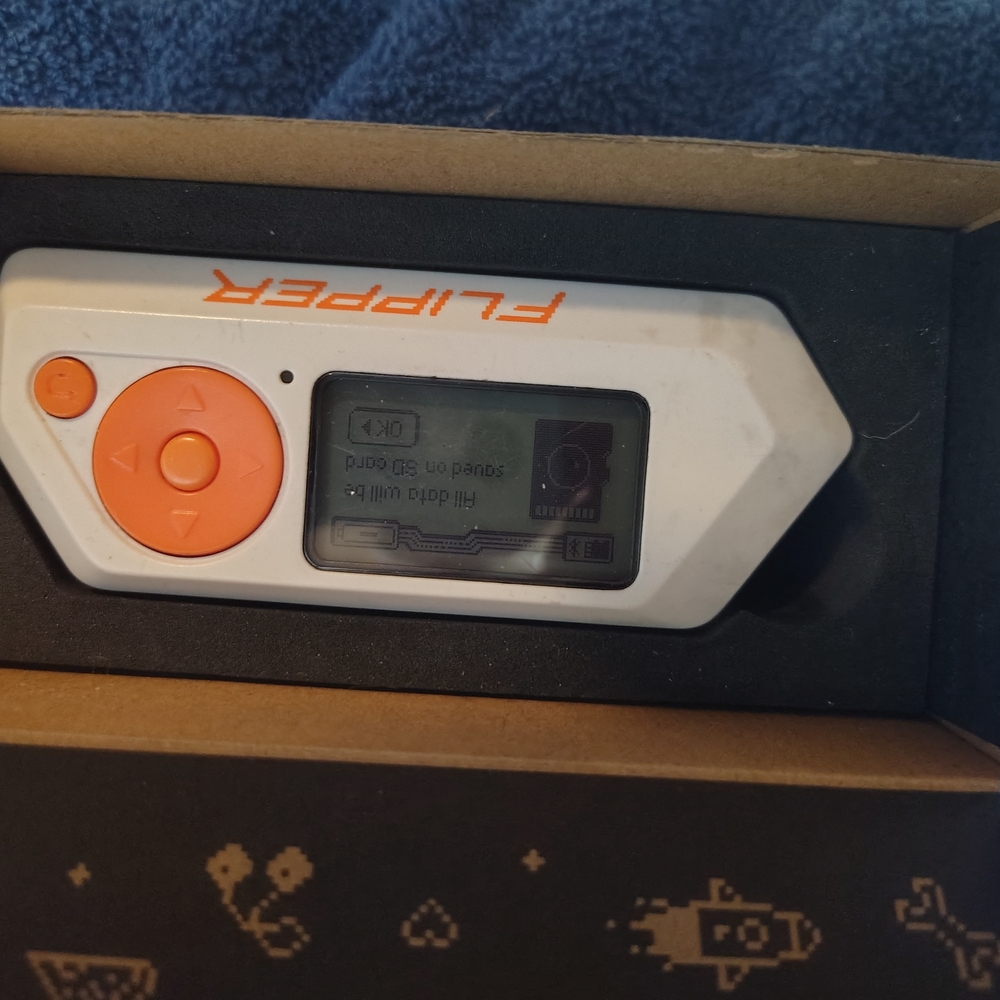 Orange and White Electronic Device